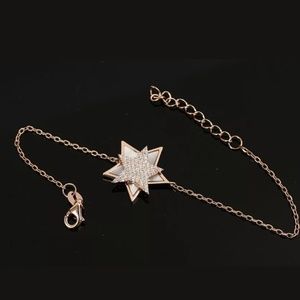 Double star mother of pearl & topaz gold bracelet